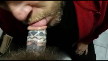 sucking tattooed cock