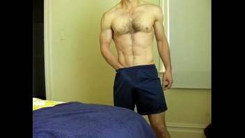 toned slightly hairy chest guy strip-jo-cum on standing